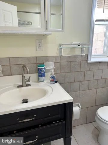 a bathroom with a sink and a toilet