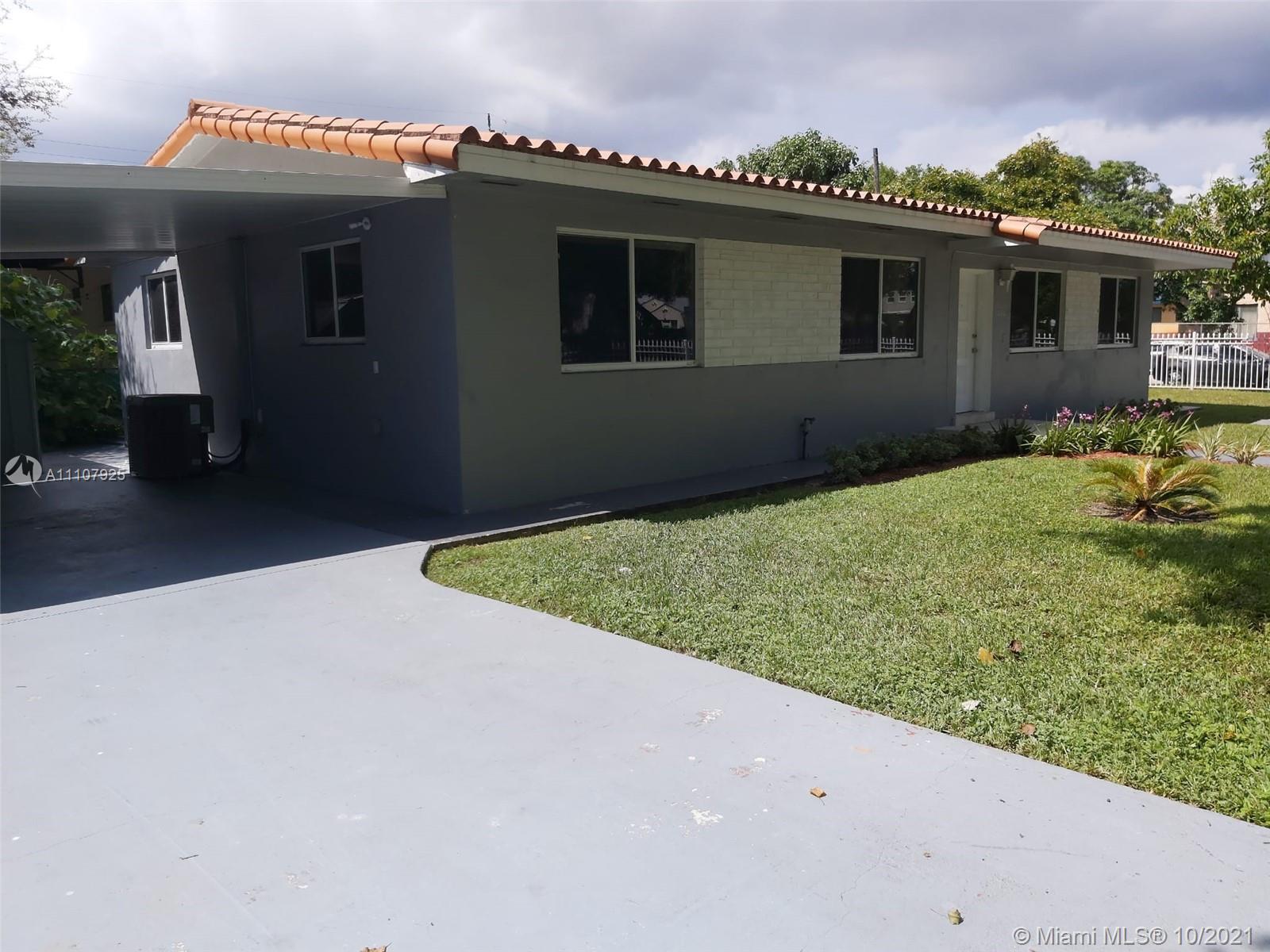 a view of outdoor space yard and garage