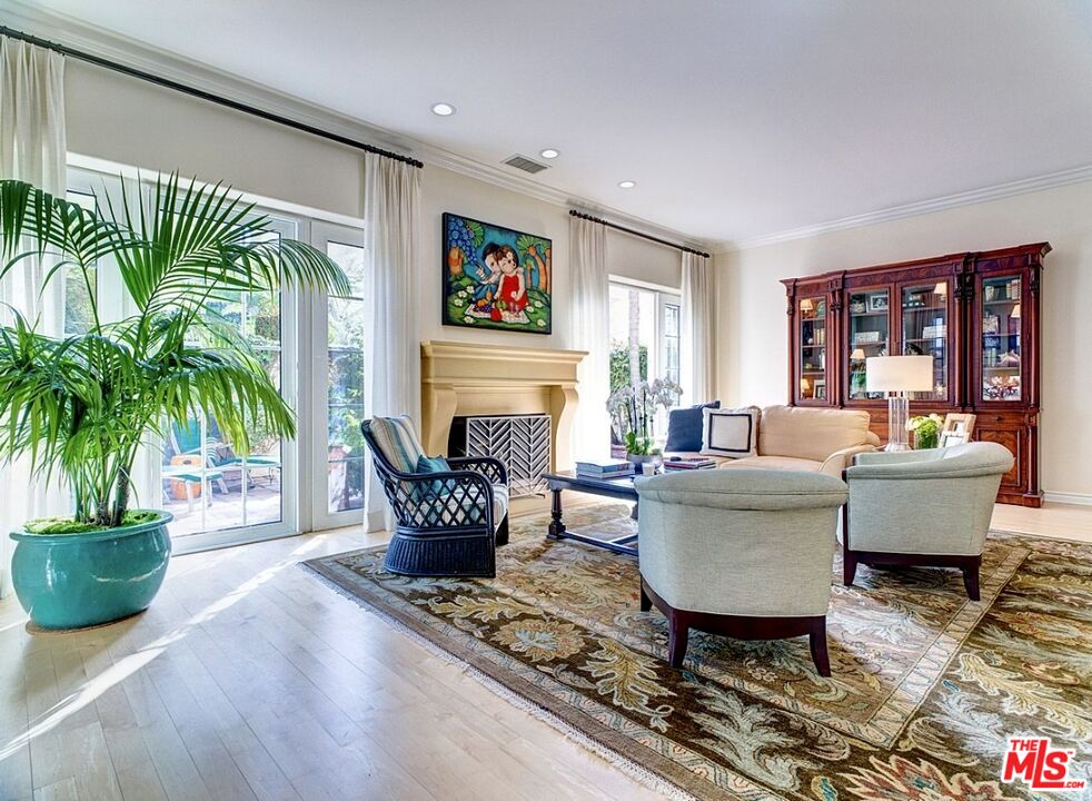 121 Ketch Mall Marina del Rey, CA 90292 - Photo 11 of 39 a living room with furniture potted plant and a fireplace