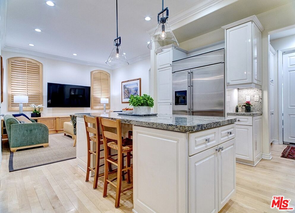 121 Ketch Mall Marina del Rey, CA 90292 - Photo 12 of 39 a kitchen with stainless steel appliances granite countertop a stove and cabinets