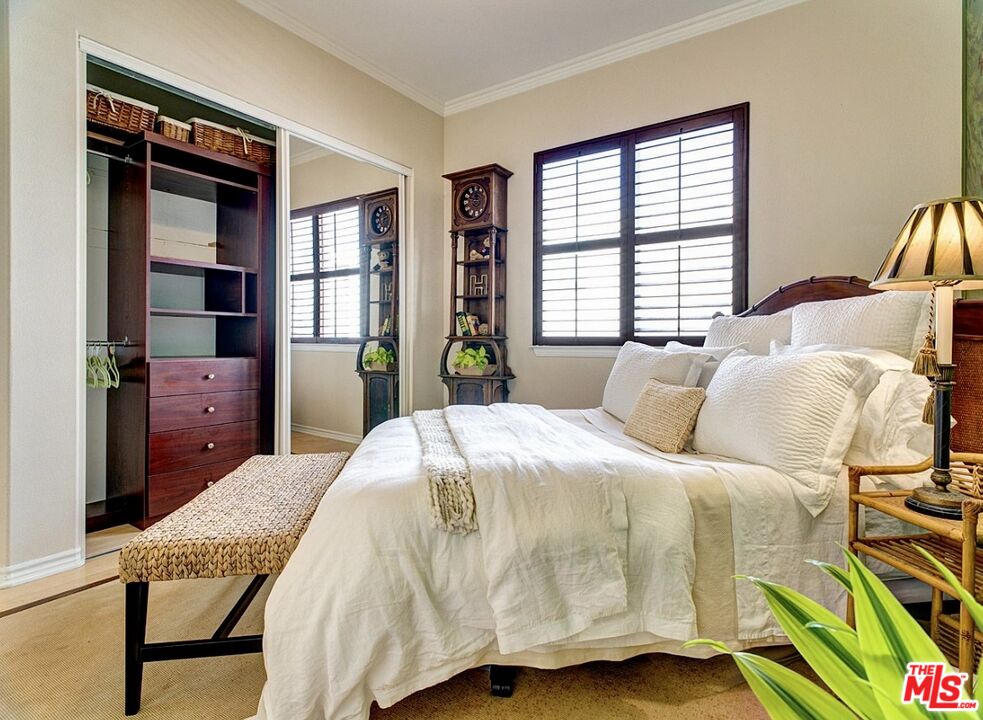 121 Ketch Mall Marina del Rey, CA 90292 - Photo 30 of 39 a spacious bedroom with a bed and a dresser next to a window
