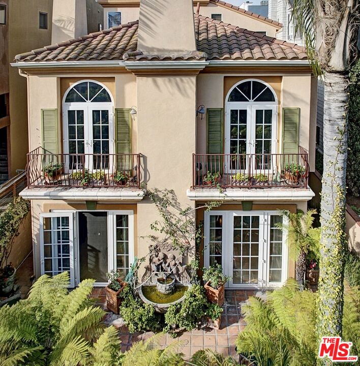 121 Ketch Mall Marina del Rey, CA 90292 - Photo 3 of 39 front view of a building with potted plants