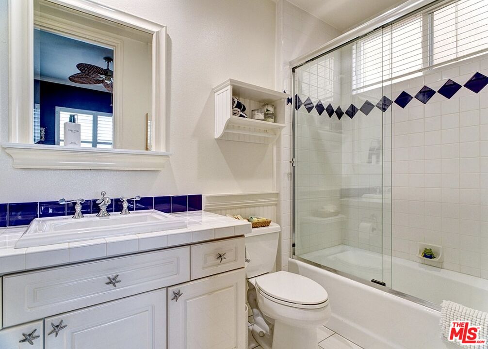 121 Ketch Mall Marina del Rey, CA 90292 - Photo 34 of 39 a bathroom with a sink a toilet and a shower
