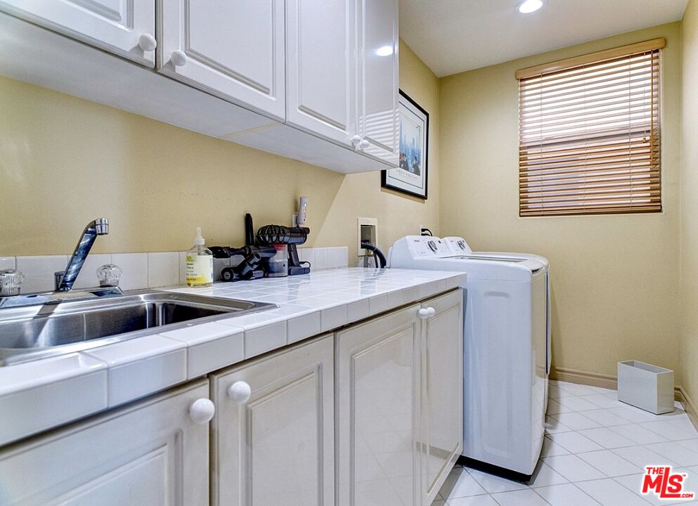121 Ketch Mall Marina del Rey, CA 90292 - Photo 35 of 39 a kitchen with a sink cabinets and window