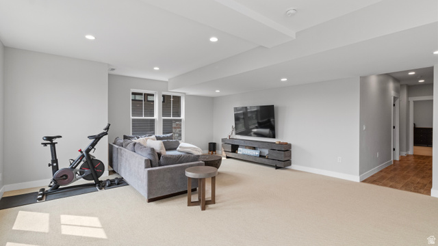355 East Overlook Loop Hideout, UT 84036 - Photo 29 of 40 Spacious recreation room featuring recessed lighting, light-toned carpeting, and a window with blinds
