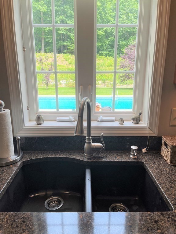 7 R Oxbow Road Oxford, MA 01537 - Photo 14 of 40 a kitchen with a sink and a window