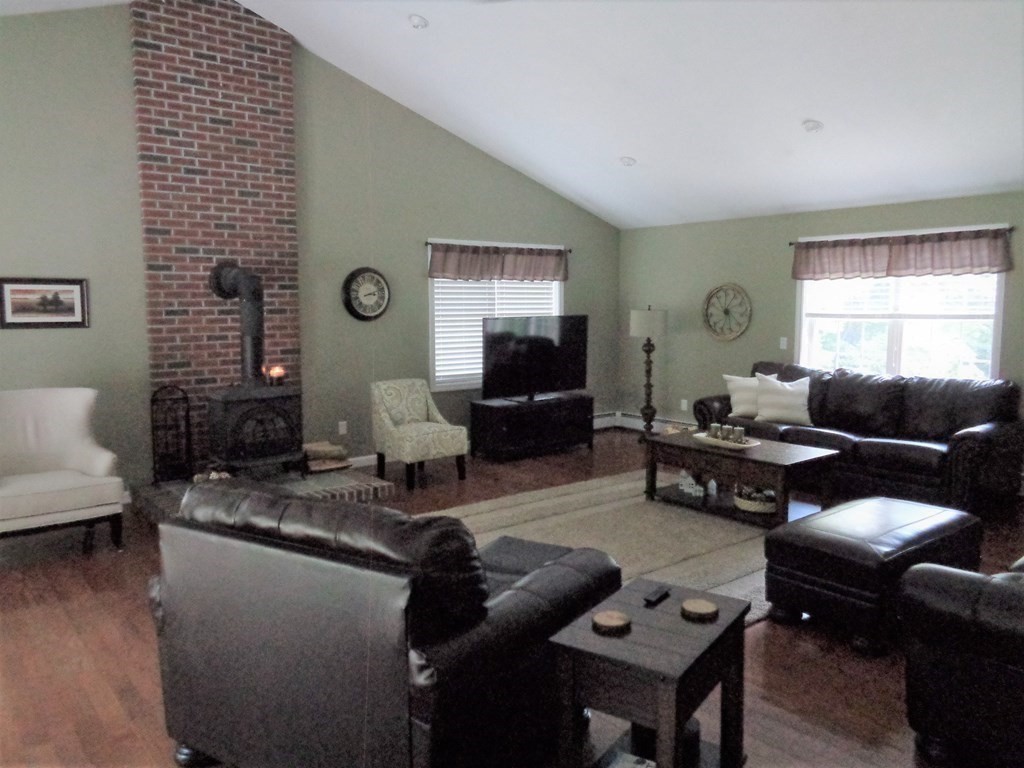 7 R Oxbow Road Oxford, MA 01537 - Photo 19 of 40 a living room with furniture and wooden floor