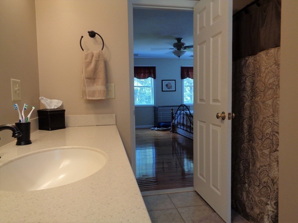 7 R Oxbow Road Oxford, MA 01537 - Photo 29 of 40 a bathroom with a sink and a tub