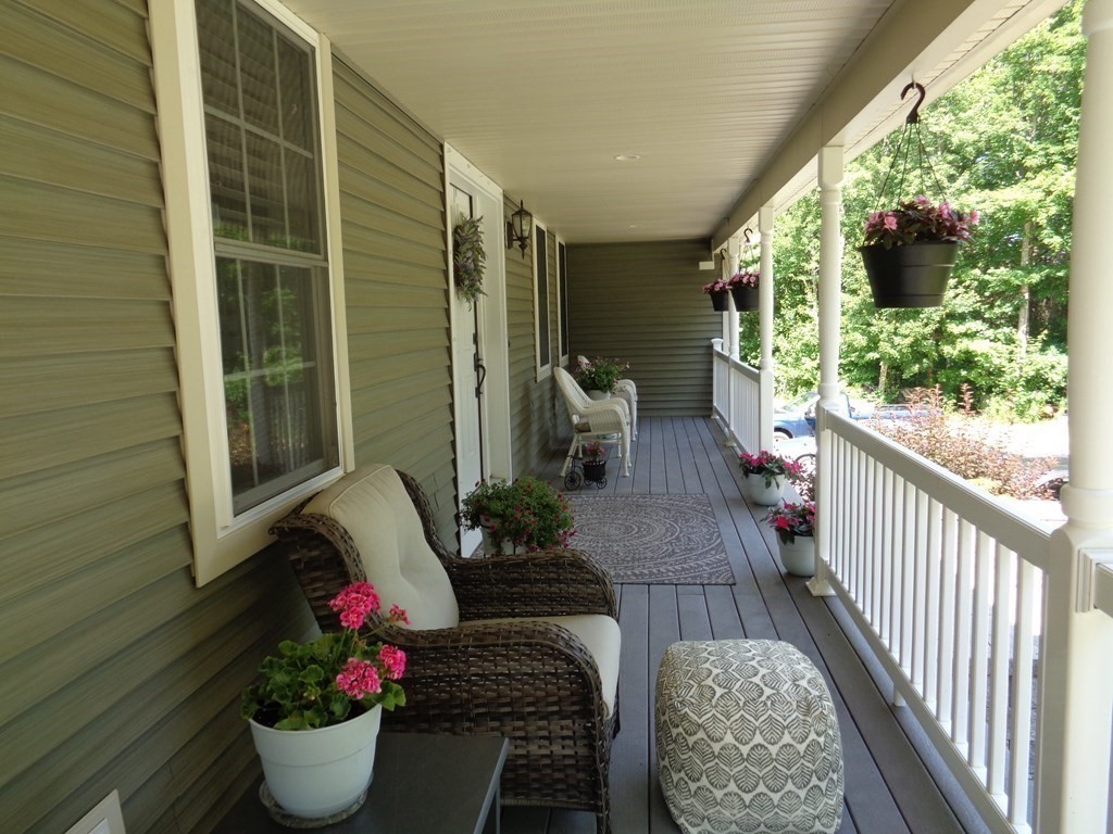 7 R Oxbow Road Oxford, MA 01537 - Photo 3 of 40 a outdoor space with furniture