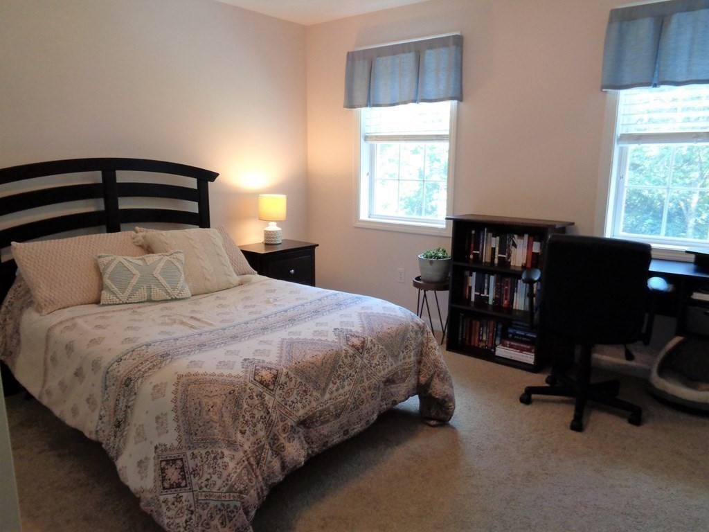 7 R Oxbow Road Oxford, MA 01537 - Photo 31 of 40 a bedroom with a bed chair and window