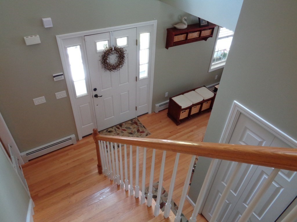 7 R Oxbow Road Oxford, MA 01537 - Photo 5 of 40 a view of a hallway and wooden floor