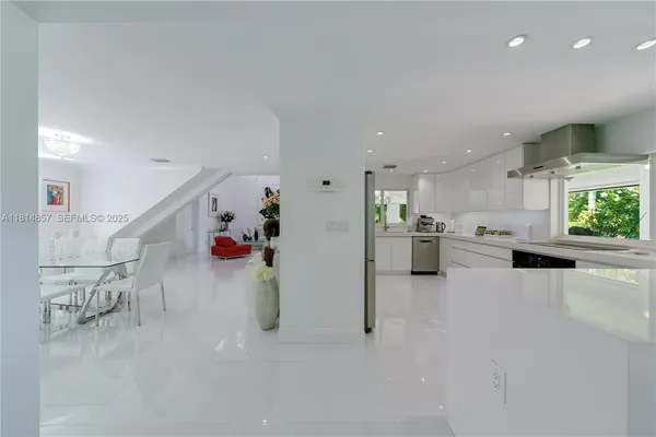 a bathroom with a sink a mirror and a toilet