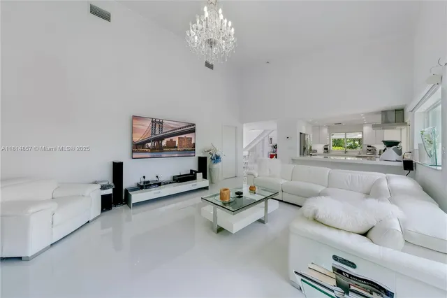 a view of a swimming pool with a yard