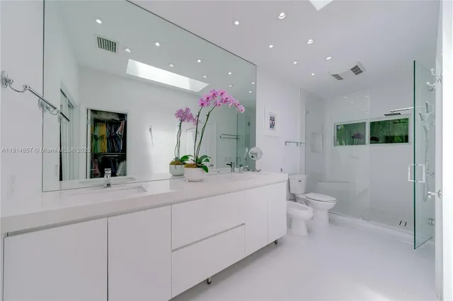 a view of a swimming pool with an outdoor space and seating area