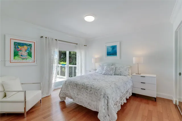 a view of a swimming pool and lounge chairs