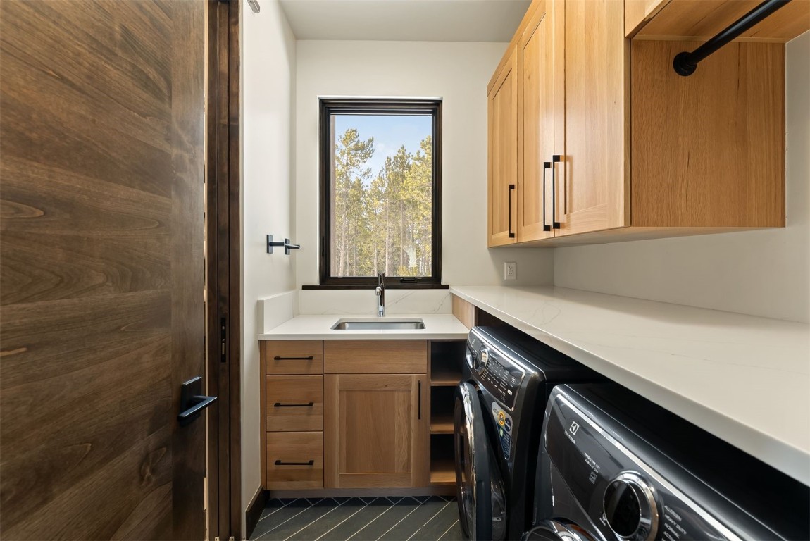 67 Marys Ridge Lane Breckenridge, CO 80424 - Photo 17 of 35 a utility room with cabinets