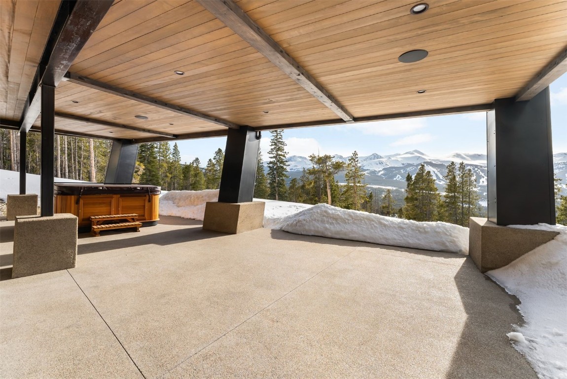 67 Marys Ridge Lane Breckenridge, CO 80424 - Photo 30 of 35 a bedroom with furniture and large windows