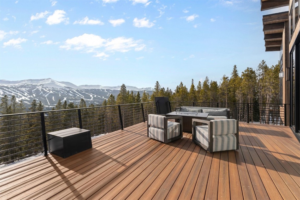 67 Marys Ridge Lane Breckenridge, CO 80424 - Photo 30 of 35 a view of a roof deck with couches and wooden floor