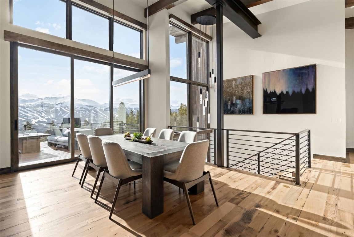67 Marys Ridge Lane Breckenridge, CO 80424 - Photo 4 of 35 a dining room with furniture a chandelier and wooden floor