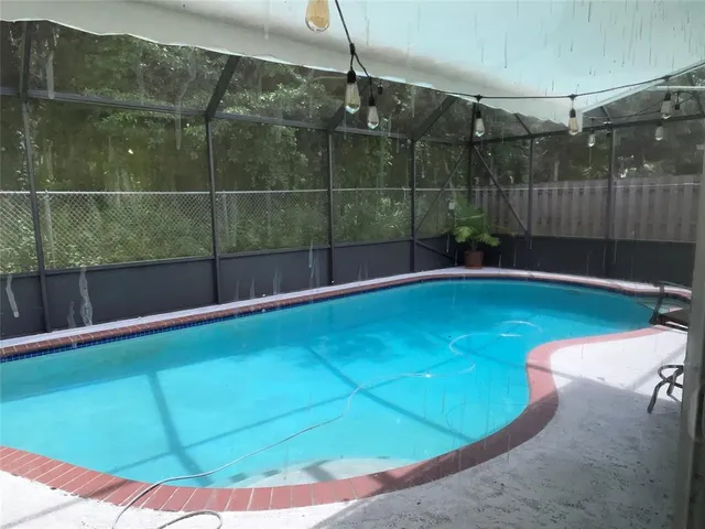 a view of a room with a bathtub in a room