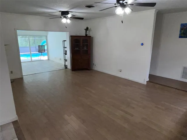 a view of a livingroom with a white furniture