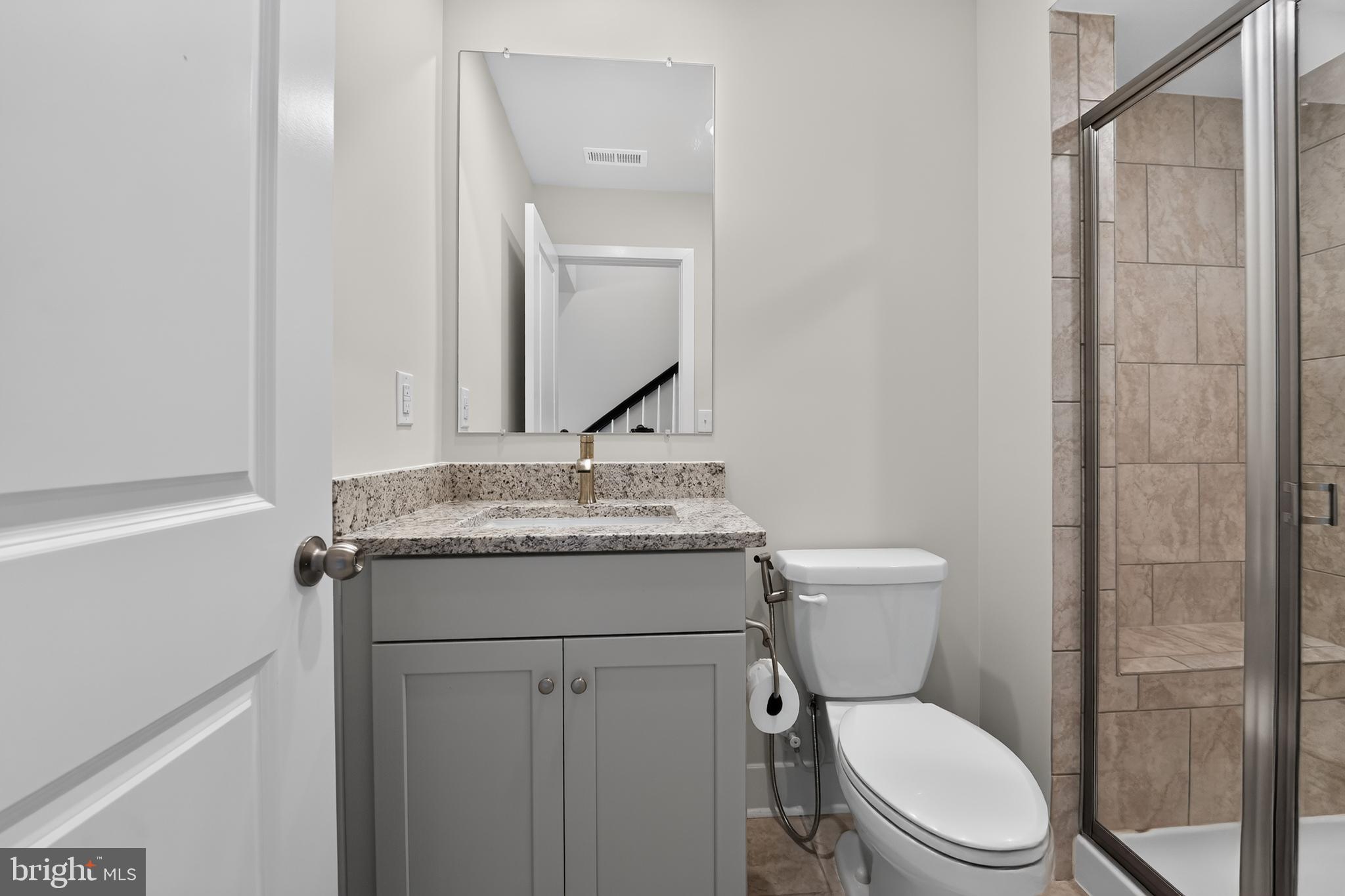 1808 Parham Way Baltimore, MD 21244 - Photo 26 of 31 Sleek modern bathroom with elegance.