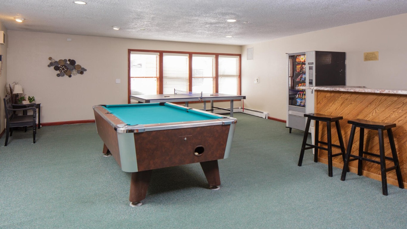 10000 Ryan Gulch Road, Unit G105 Silverthorne, CO 80498 - Photo 29 of 37 Rec room featuring a textured ceiling, dark colored carpet, billiards, recessed lighting, and a baseboard heating unit