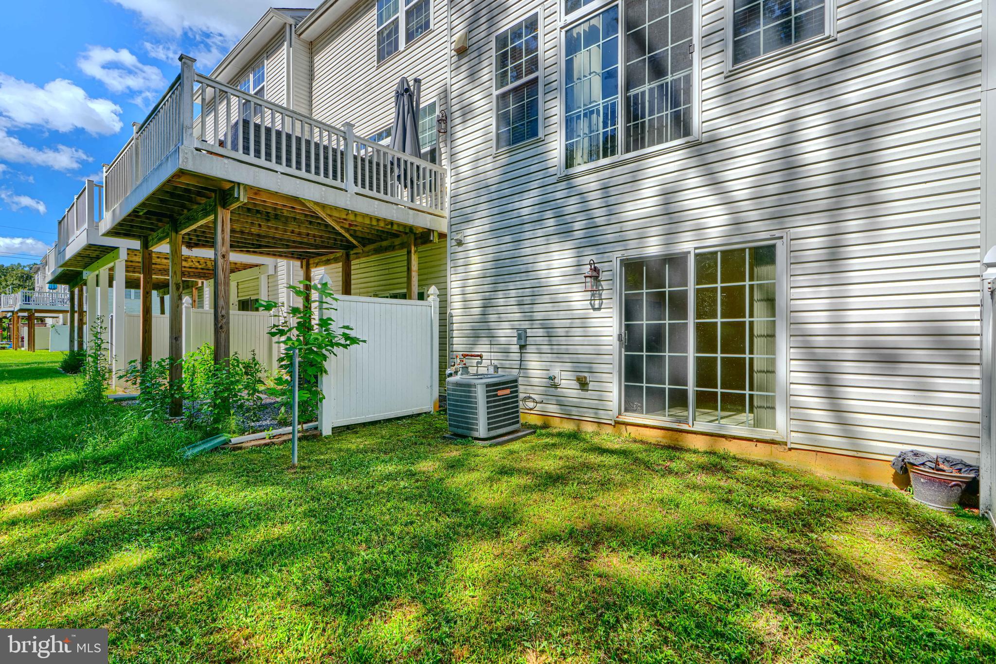 44317 Ocelot Way California, MD 20619 - Photo 14 of 45 a view of a house with a yard and sitting area