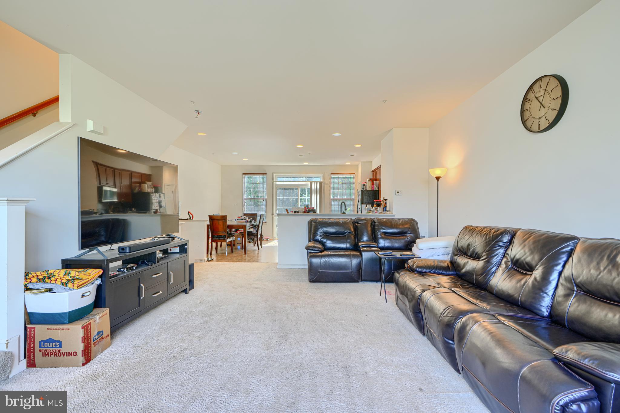 44317 Ocelot Way California, MD 20619 - Photo 17 of 45 a living room with furniture and a flat screen tv