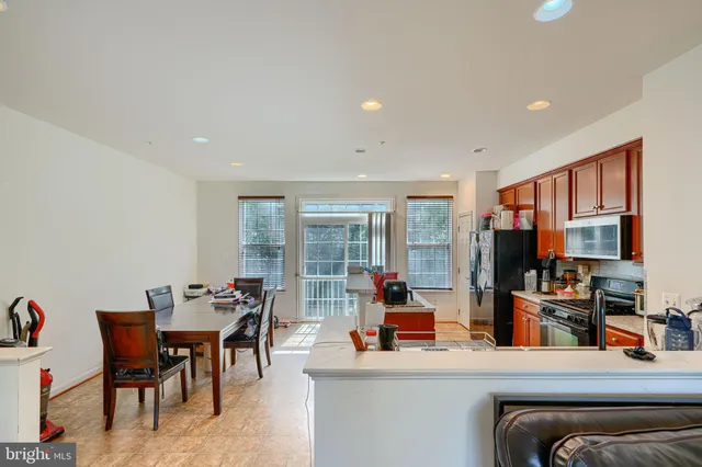 a room with furniture and a flat screen tv