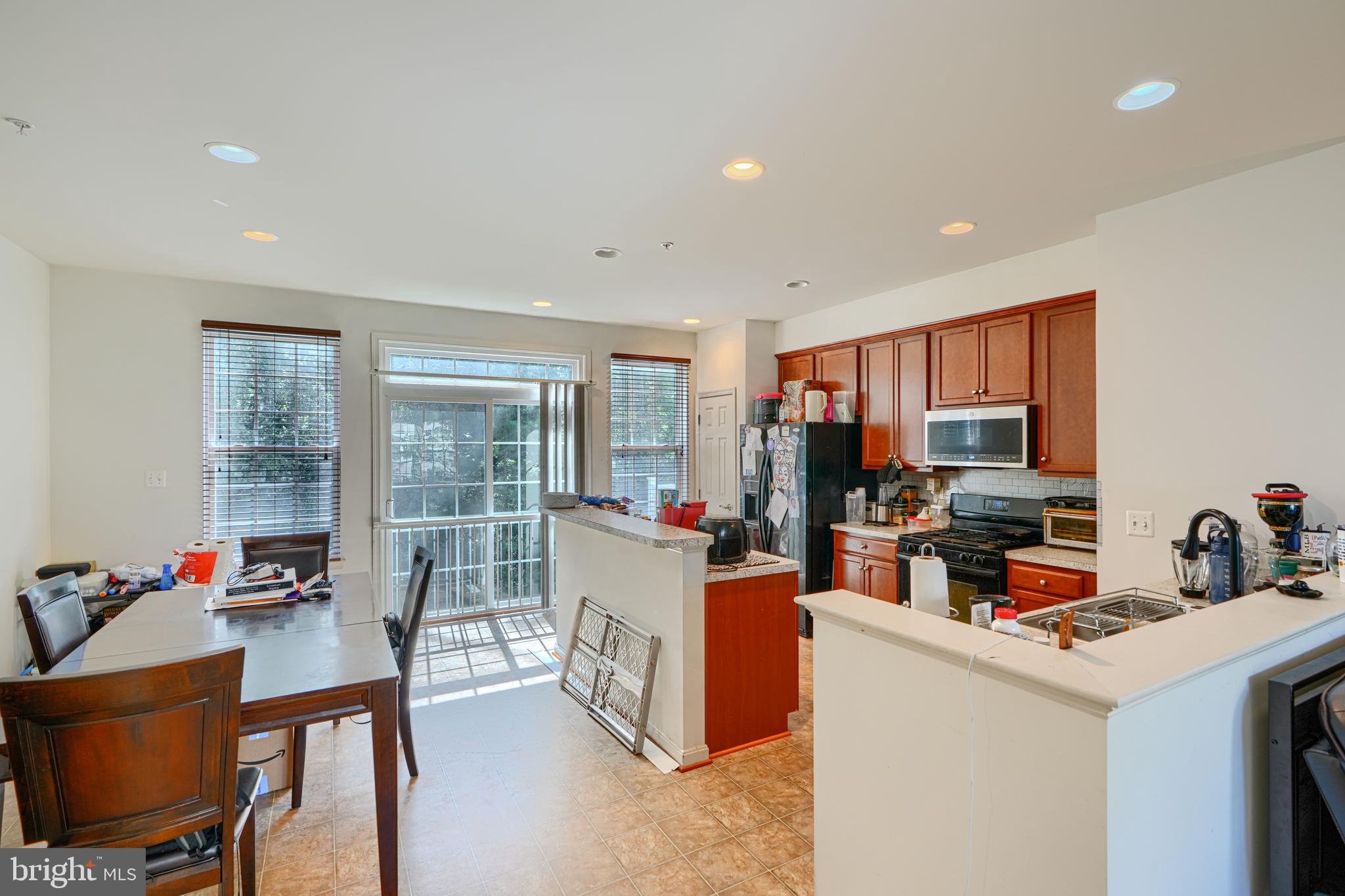 44317 Ocelot Way California, MD 20619 - Photo 19 of 45 a living room with furniture and a flat screen tv
