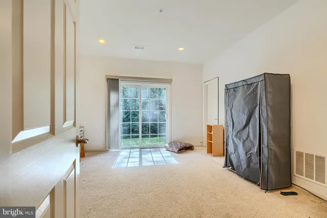 a view of a storage & utility room with a sink