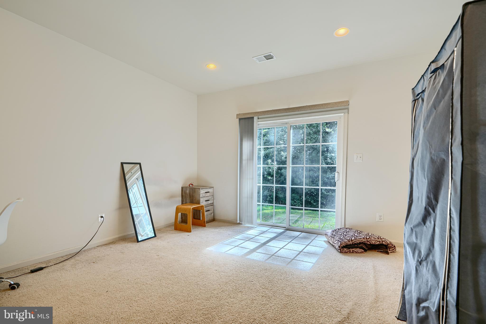 44317 Ocelot Way California, MD 20619 - Photo 4 of 45 a bed room with a bed and a chair