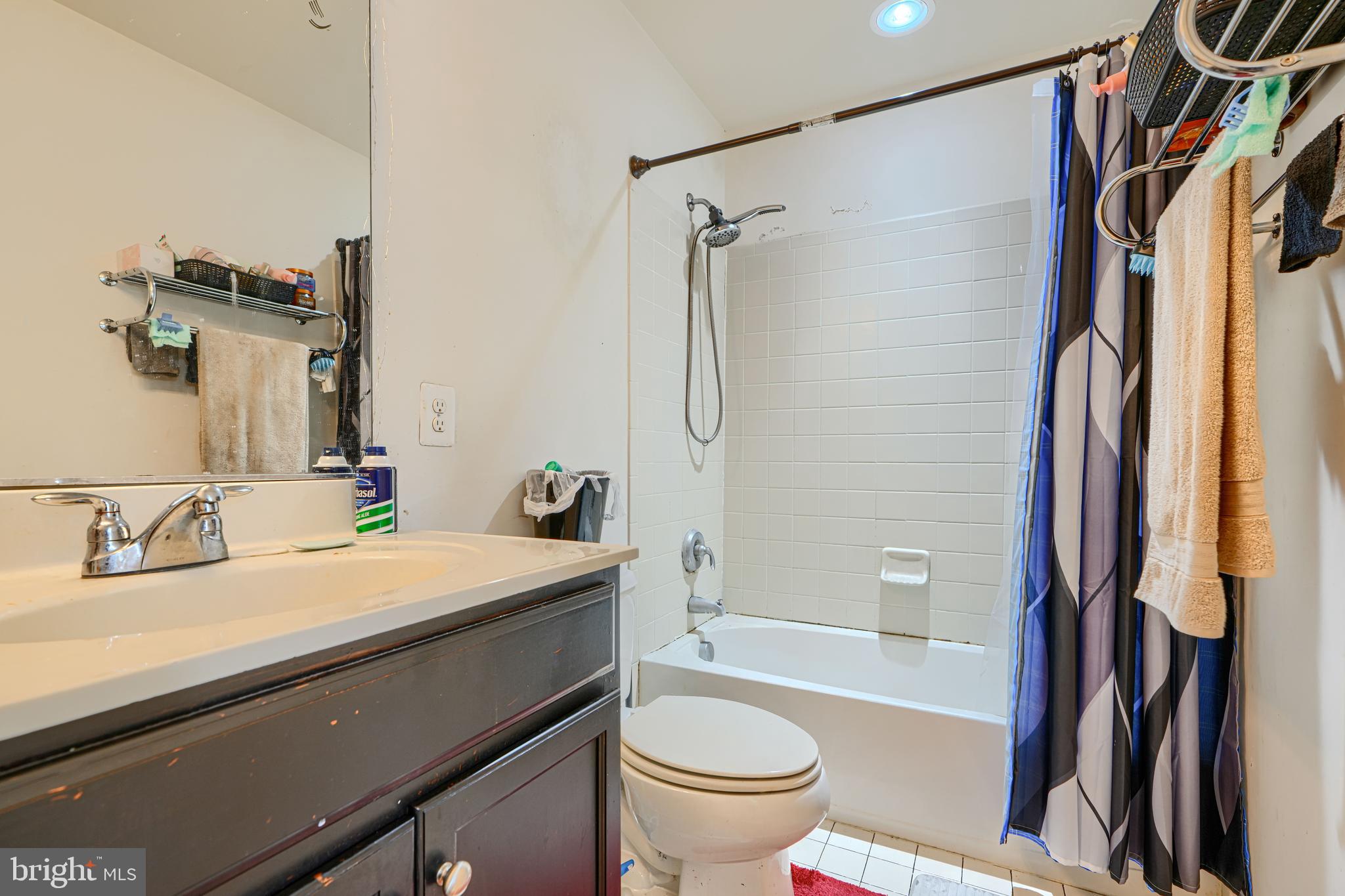 44317 Ocelot Way California, MD 20619 - Photo 44 of 45 a bathroom with a sink a toilet and a bathtub