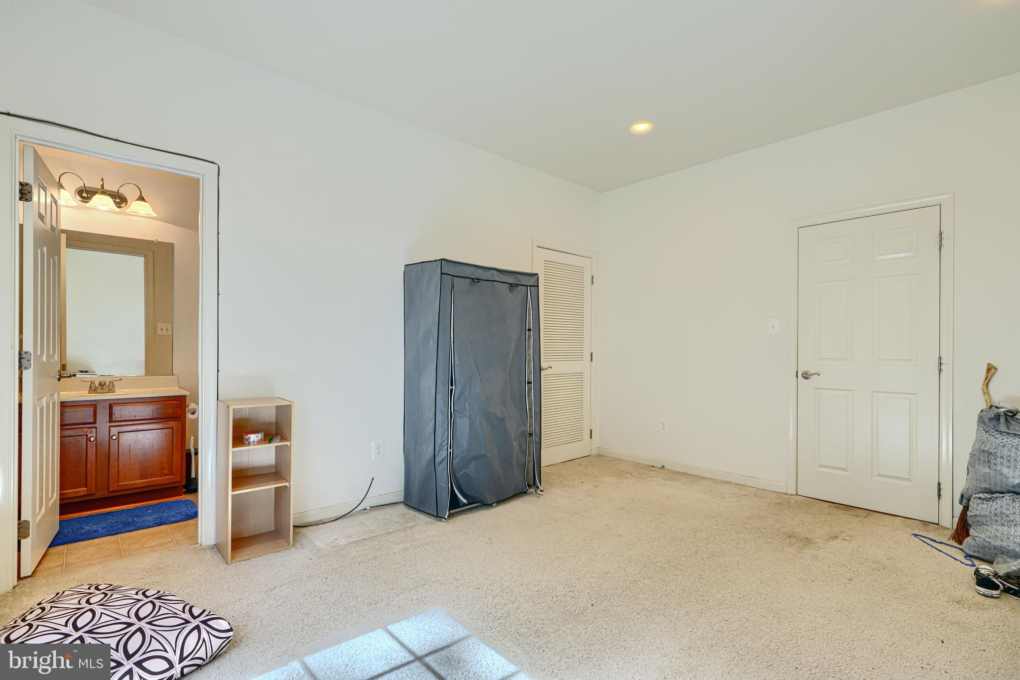 44317 Ocelot Way California, MD 20619 - Photo 6 of 45 a view of an empty room and kitchen