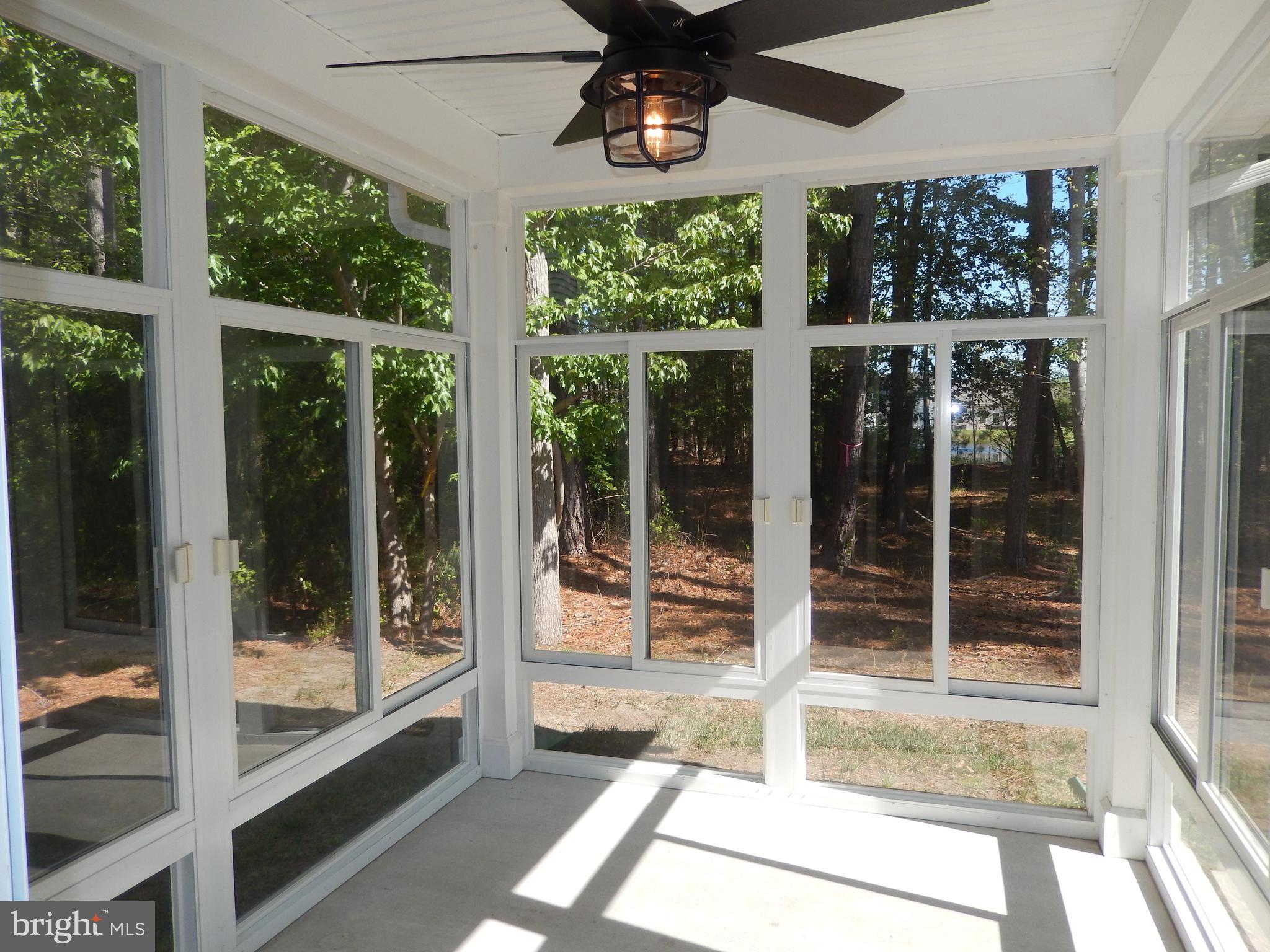 36884 Red Cedar Loop Ocean View, DE 19970 - Photo 21 of 50 a view of a glass door with a door