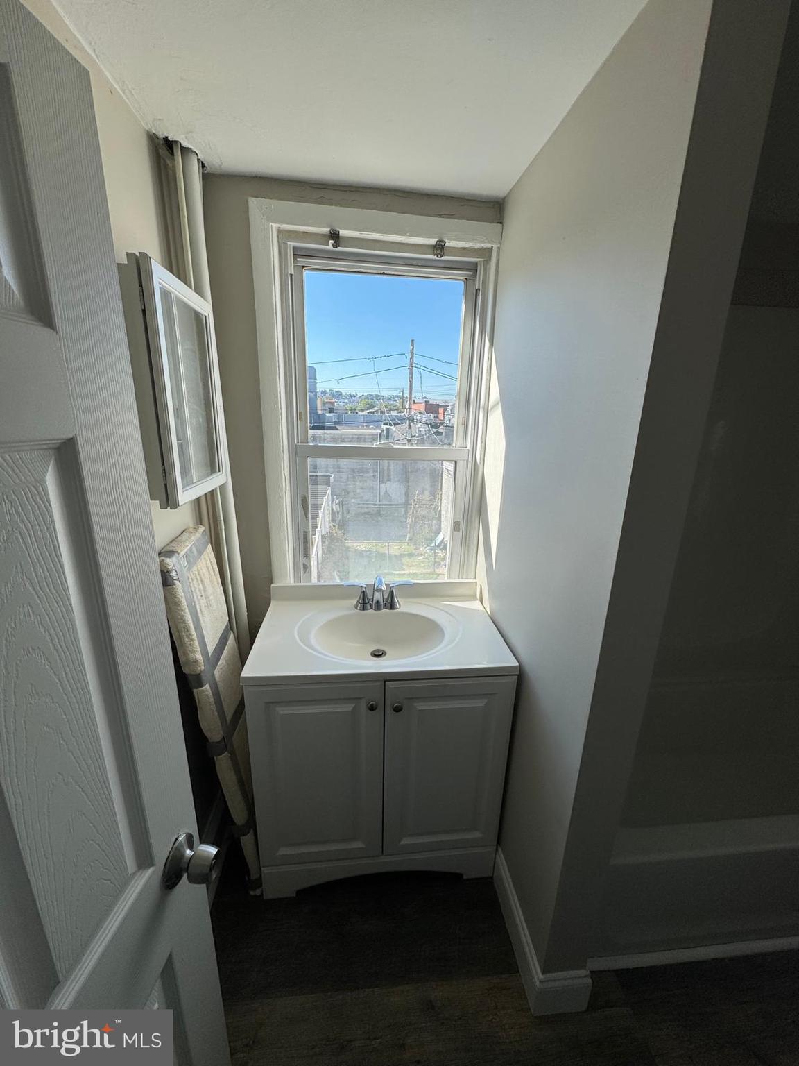 326 East Airy Street, Unit 2 Norristown, PA 19401 - Photo 7 of 8 a bathroom with a sink a mirror and a bathtub