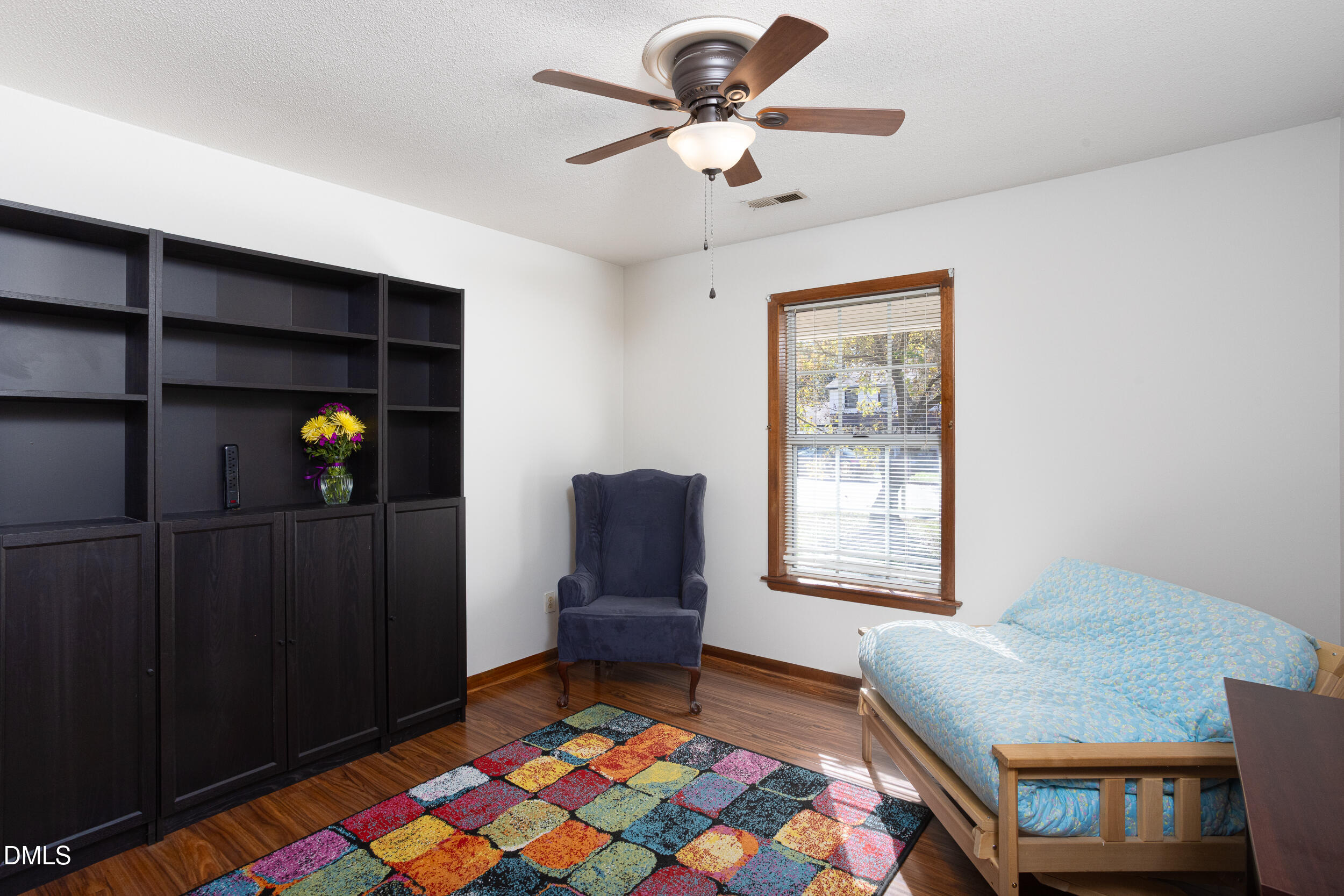5520 Round Hill Lane Raleigh, NC 27616 - Photo 16 of 29 a bedroom with a bed and a window