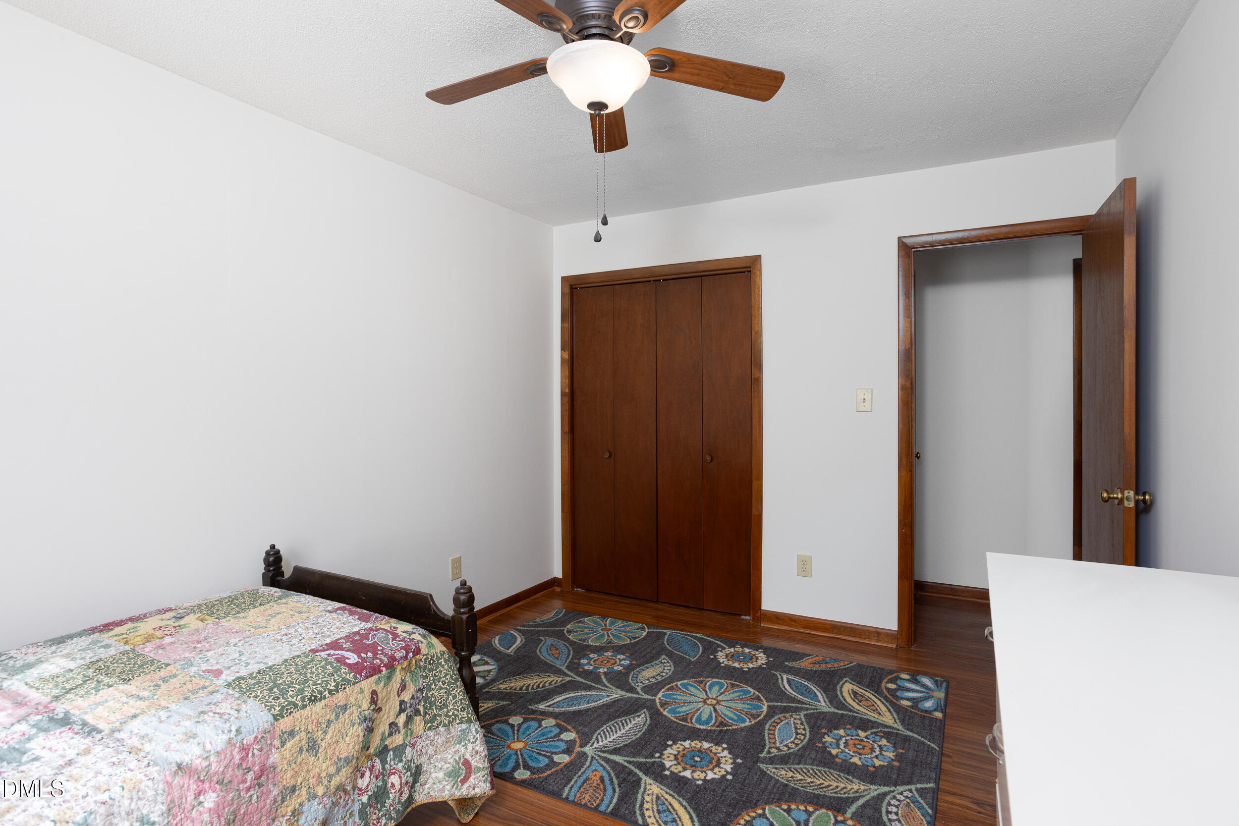 5520 Round Hill Lane Raleigh, NC 27616 - Photo 20 of 29 a bedroom with a bed and a dresser