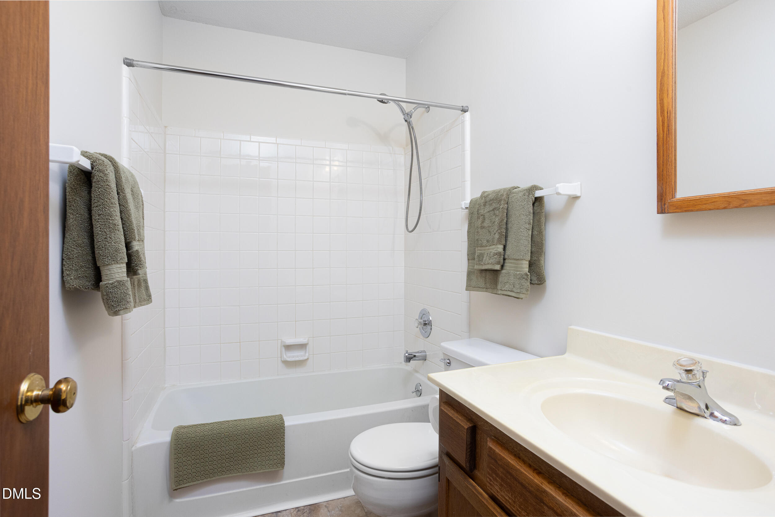 5520 Round Hill Lane Raleigh, NC 27616 - Photo 23 of 29 a bathroom with a sink toilet and shower