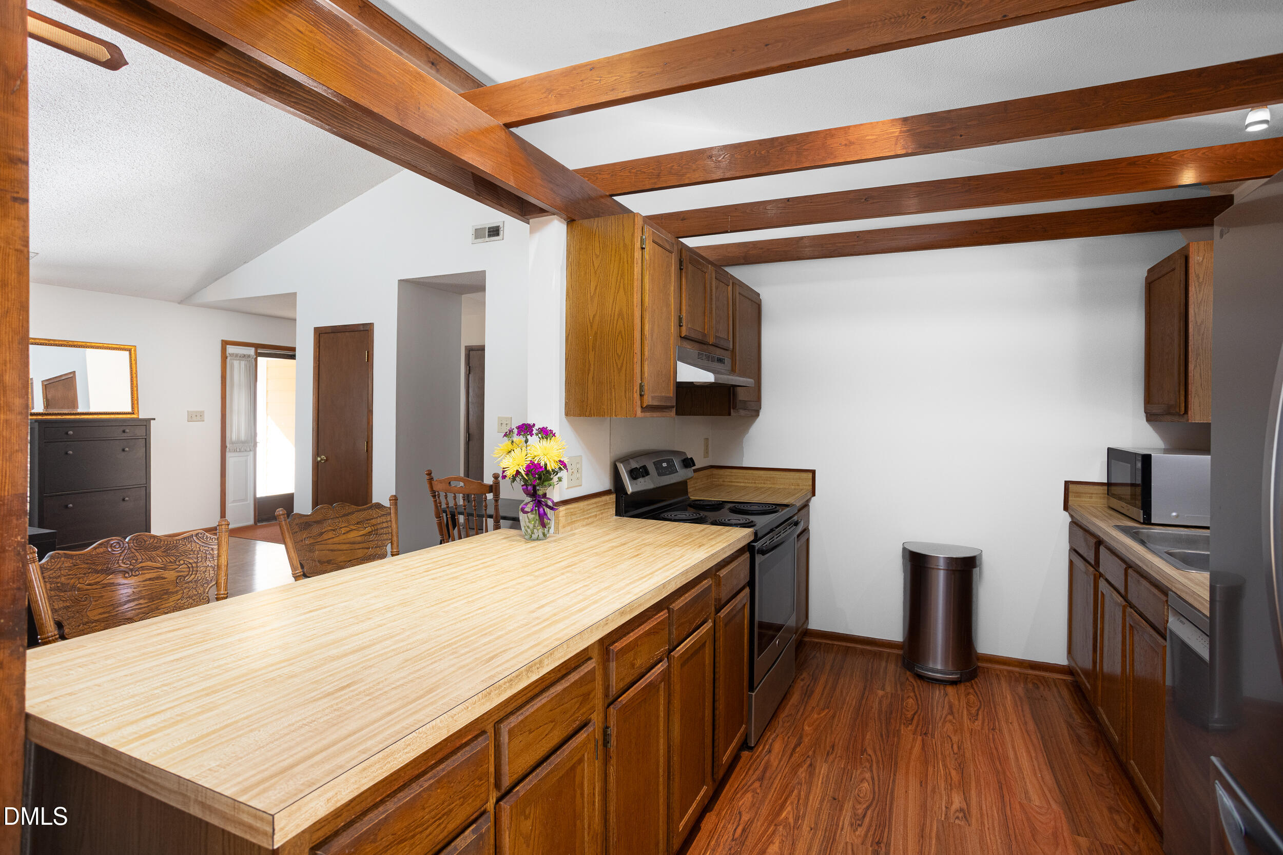 5520 Round Hill Lane Raleigh, NC 27616 - Photo 8 of 29 a kitchen with a sink appliances and cabinets