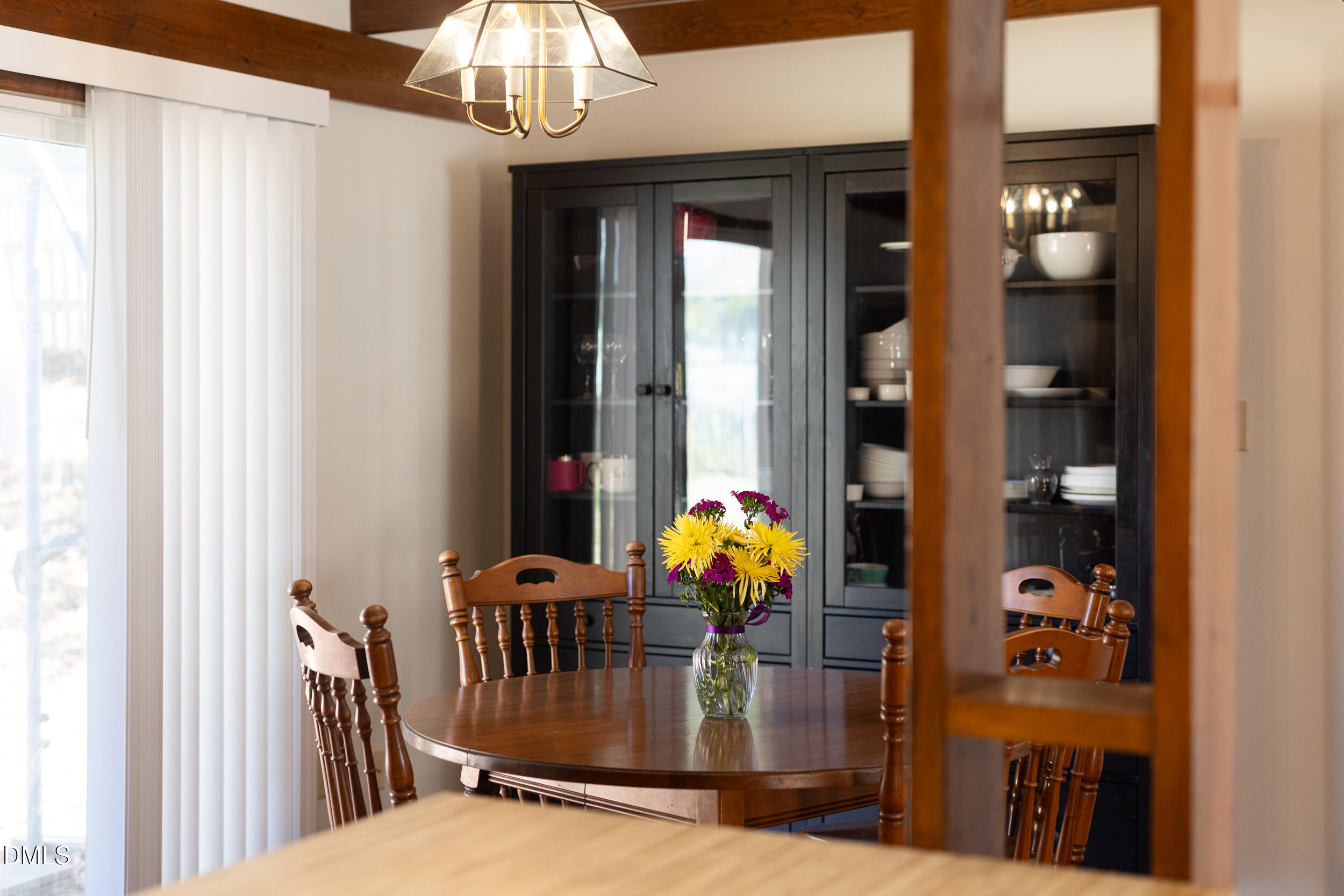 5520 Round Hill Lane Raleigh, NC 27616 - Photo 9 of 29 a dining room with furniture and chandelier