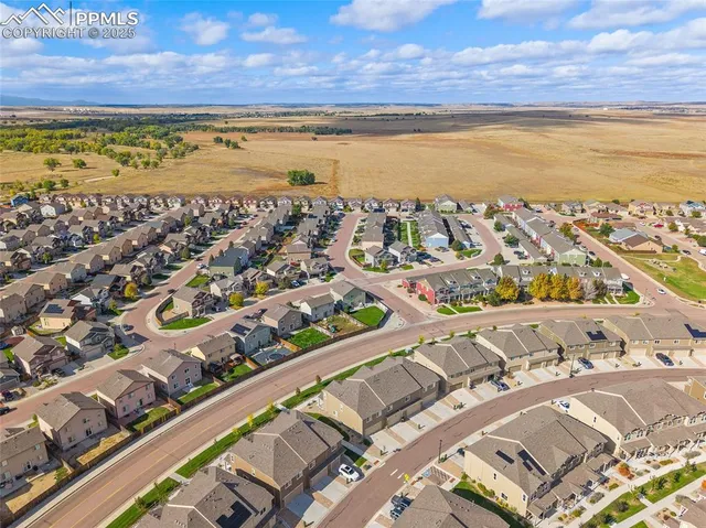 a view of a city with an ocean