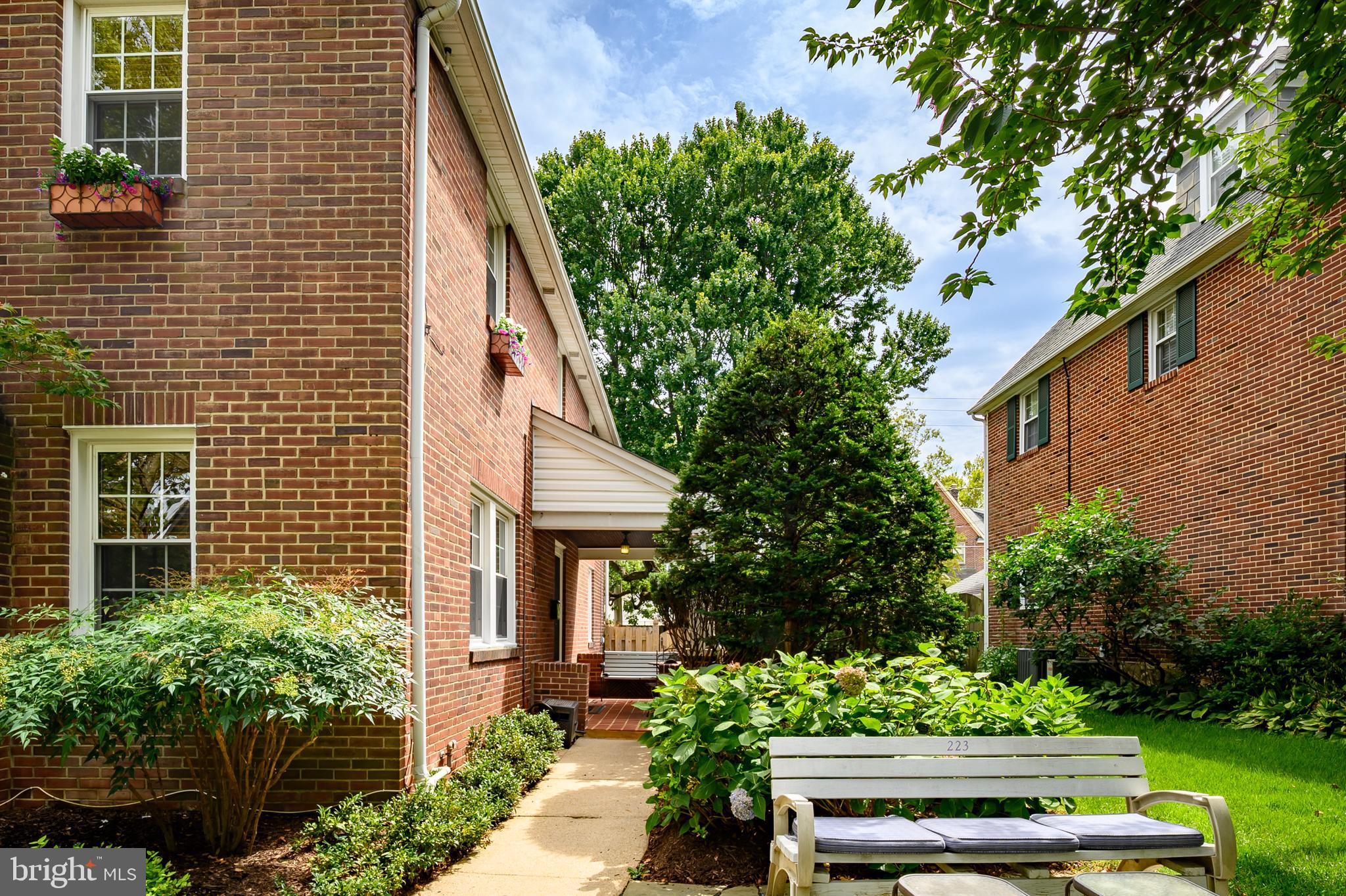 223 Dunkirk Road Baltimore, MD 21212 - Photo 3 of 52 a view of a house with a flower garden
