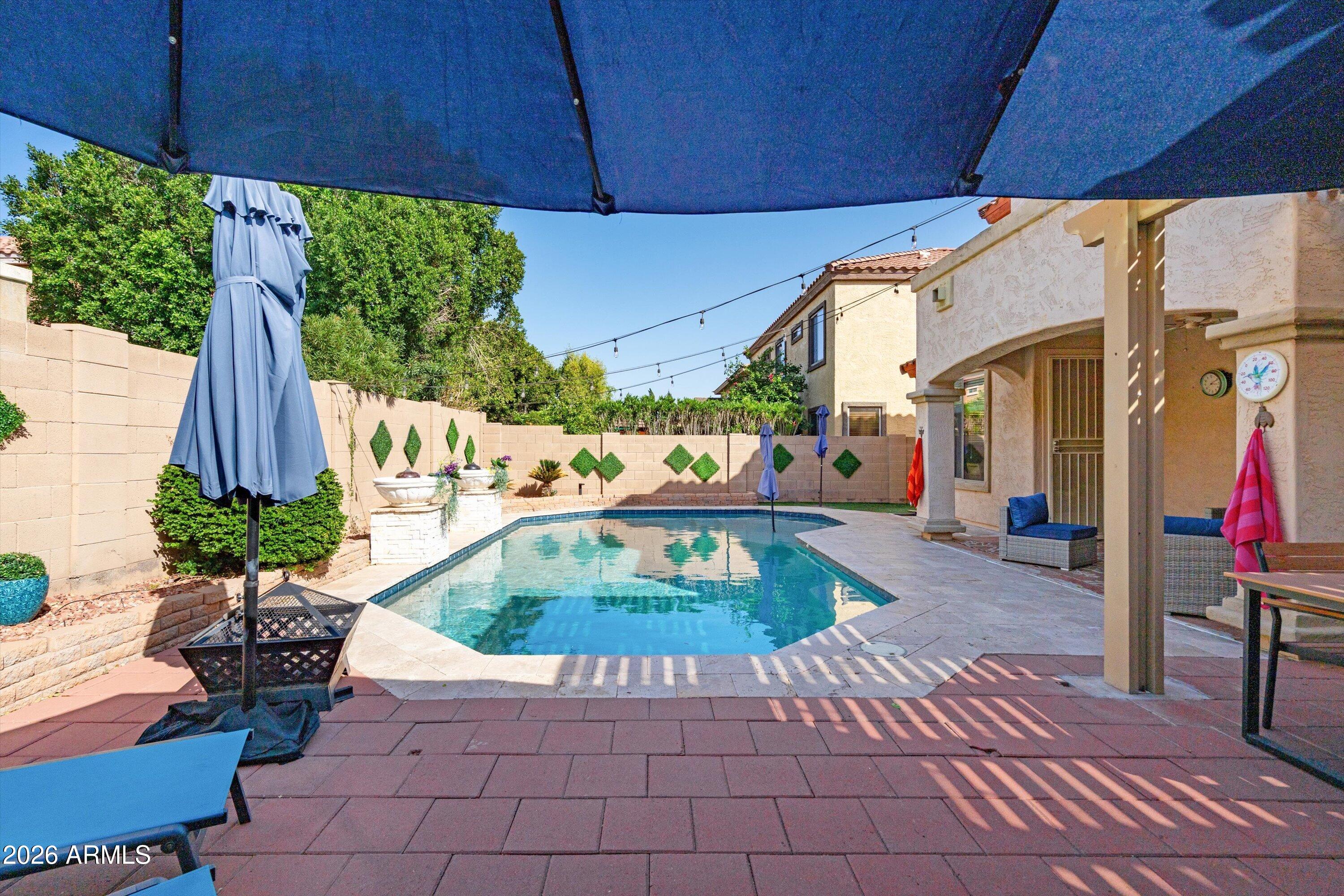 16018 West Shangri La Road Surprise, AZ 85379 - Photo 9 of 40 a outdoor space with lots of potted plants