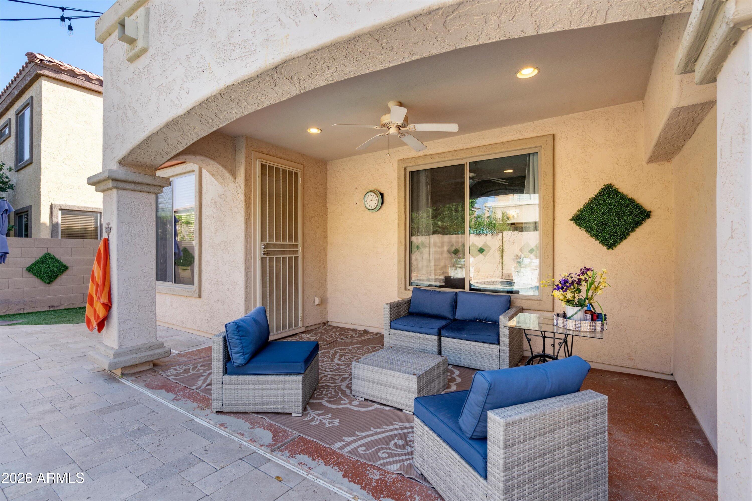 16018 West Shangri La Road Surprise, AZ 85379 - Photo 12 of 40 a living room with furniture and a window