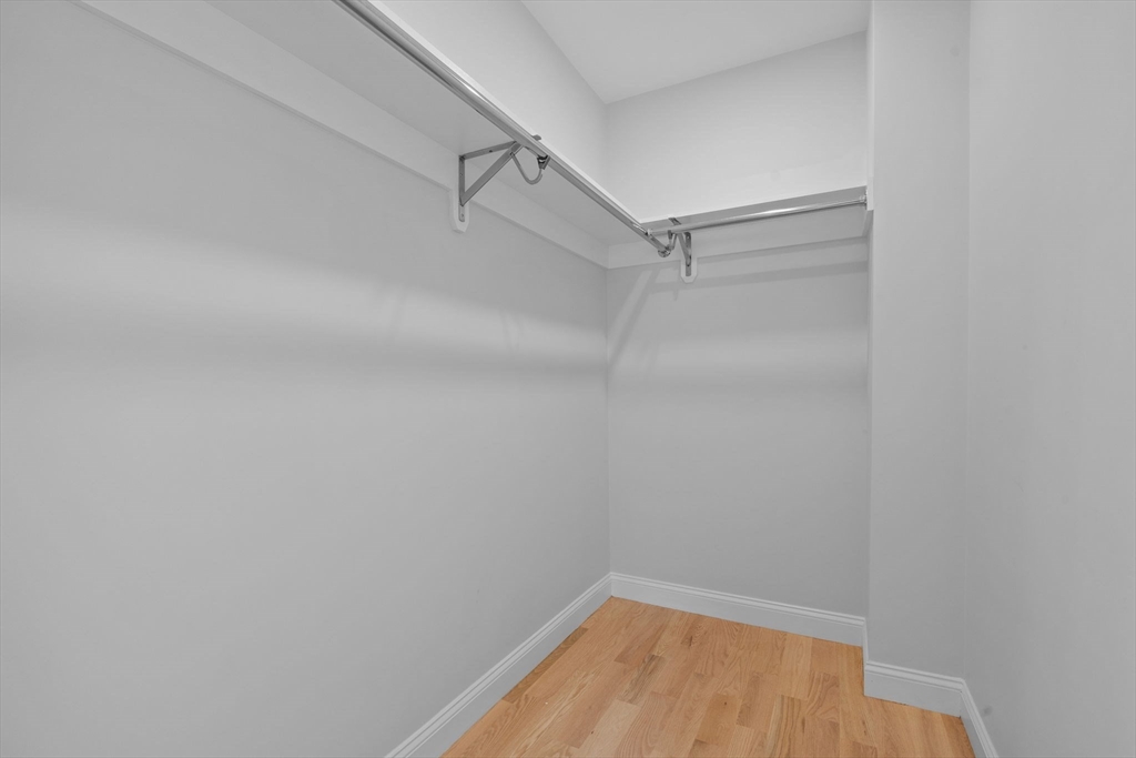 31 Rodman Street, Unit 2 Boston, MA 02130 - Photo 26 of 40 a view of a room with racks on the wall