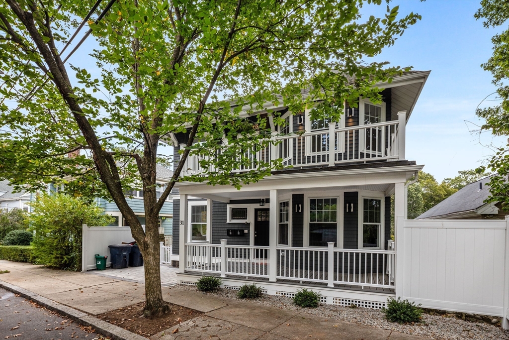 31 Rodman Street, Unit 2 Boston, MA 02130 - Photo 29 of 40 front view of a house with a tree