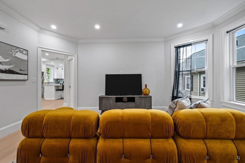 31 Rodman Street, Unit 2 Boston, MA 02130 - Photo 9 of 40 a bedroom with bed and window