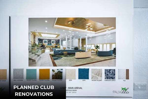 a view of a dining room with furniture and a potted plant